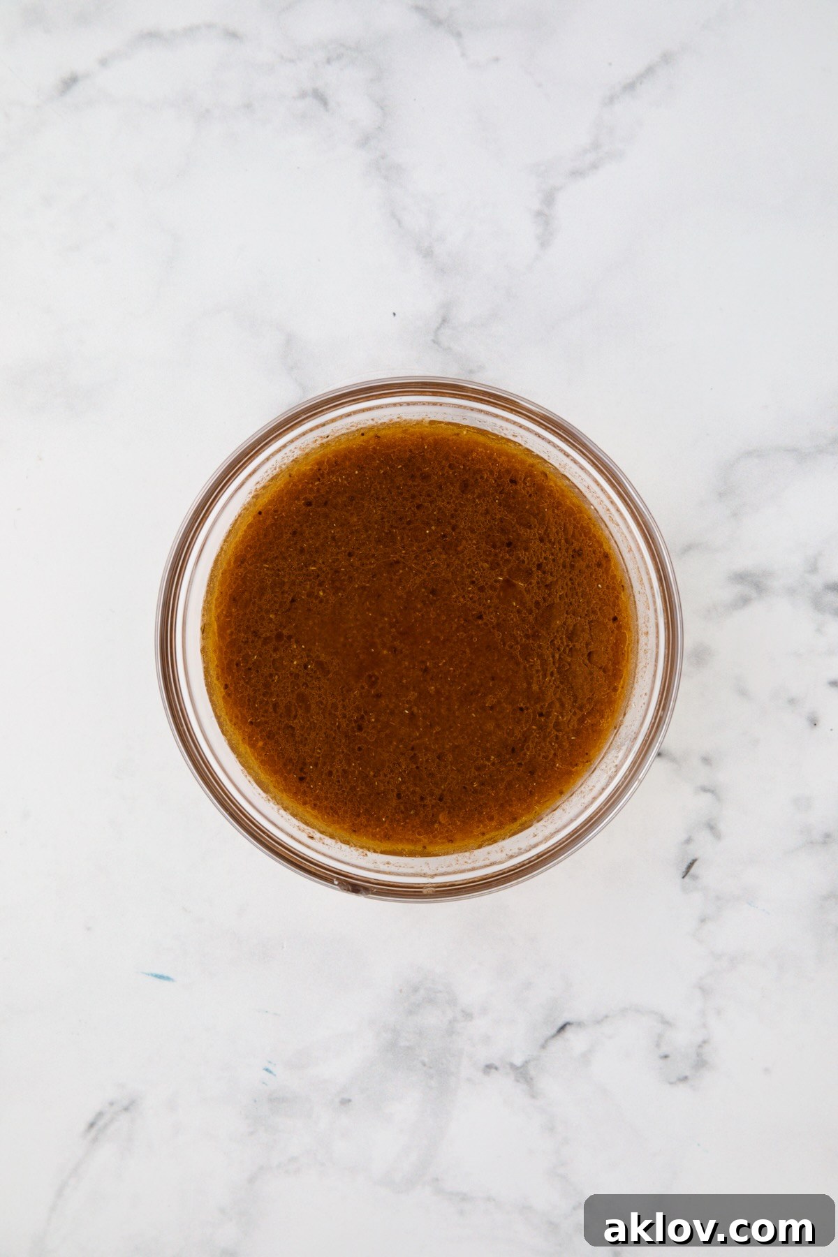 Marinade for skirt steak in glass bowl.