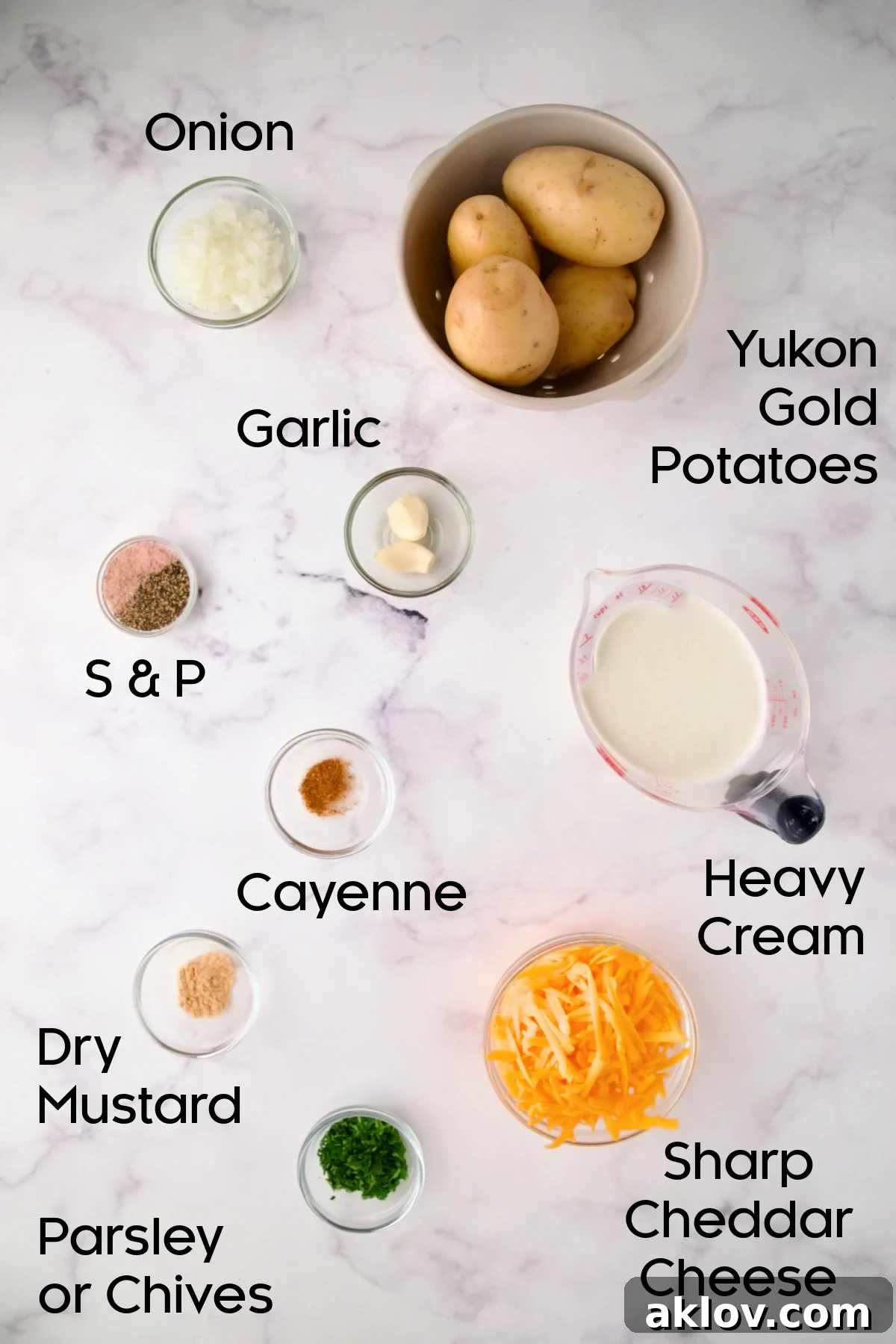 A curated display of fresh ingredients for Au Gratin Potatoes for Two in various glass bowls, ready for preparation.