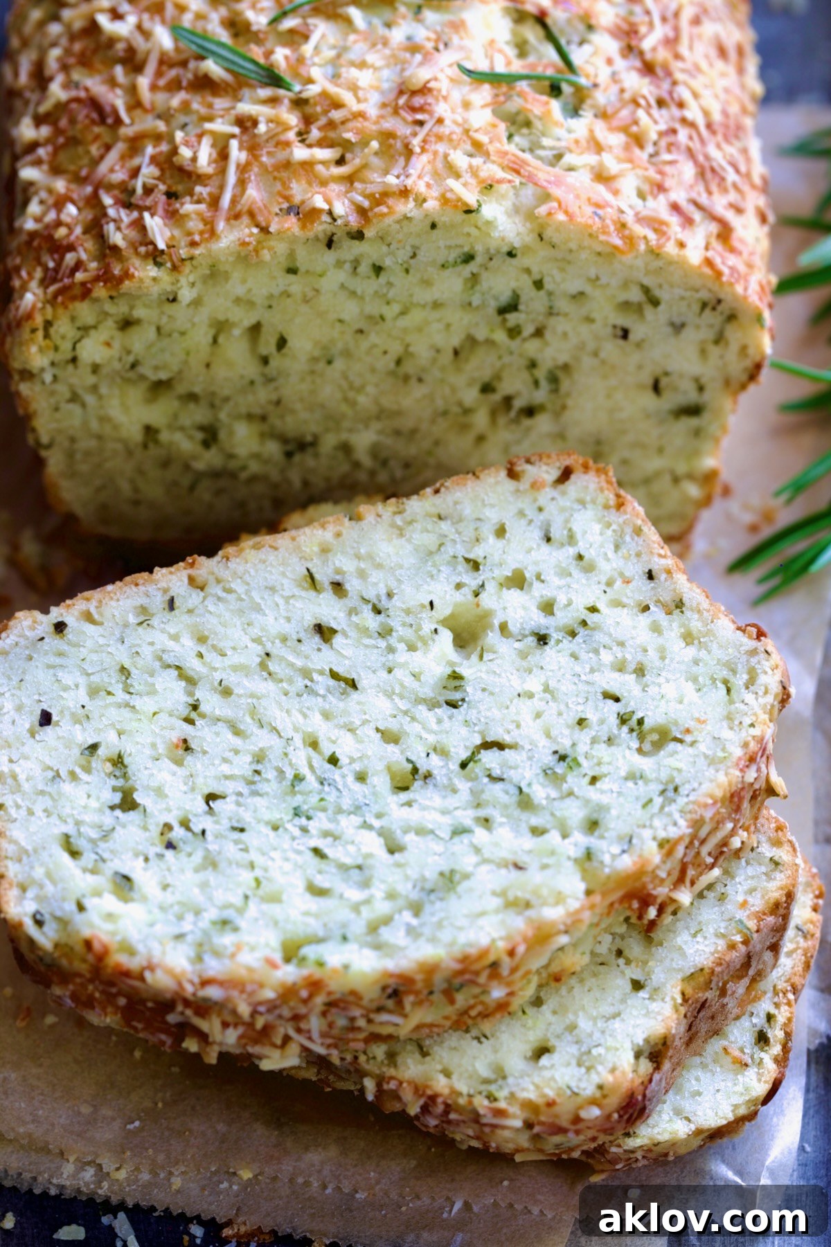 Sliced loaf of Easy Herb Bread.