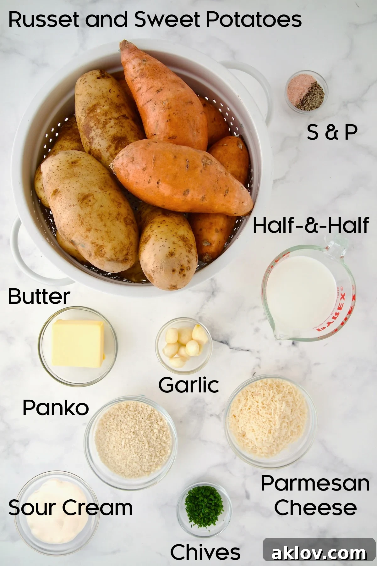Ingredients for Potato and Sweet Potato Bake in glass bowls with potatoes in a white colander.