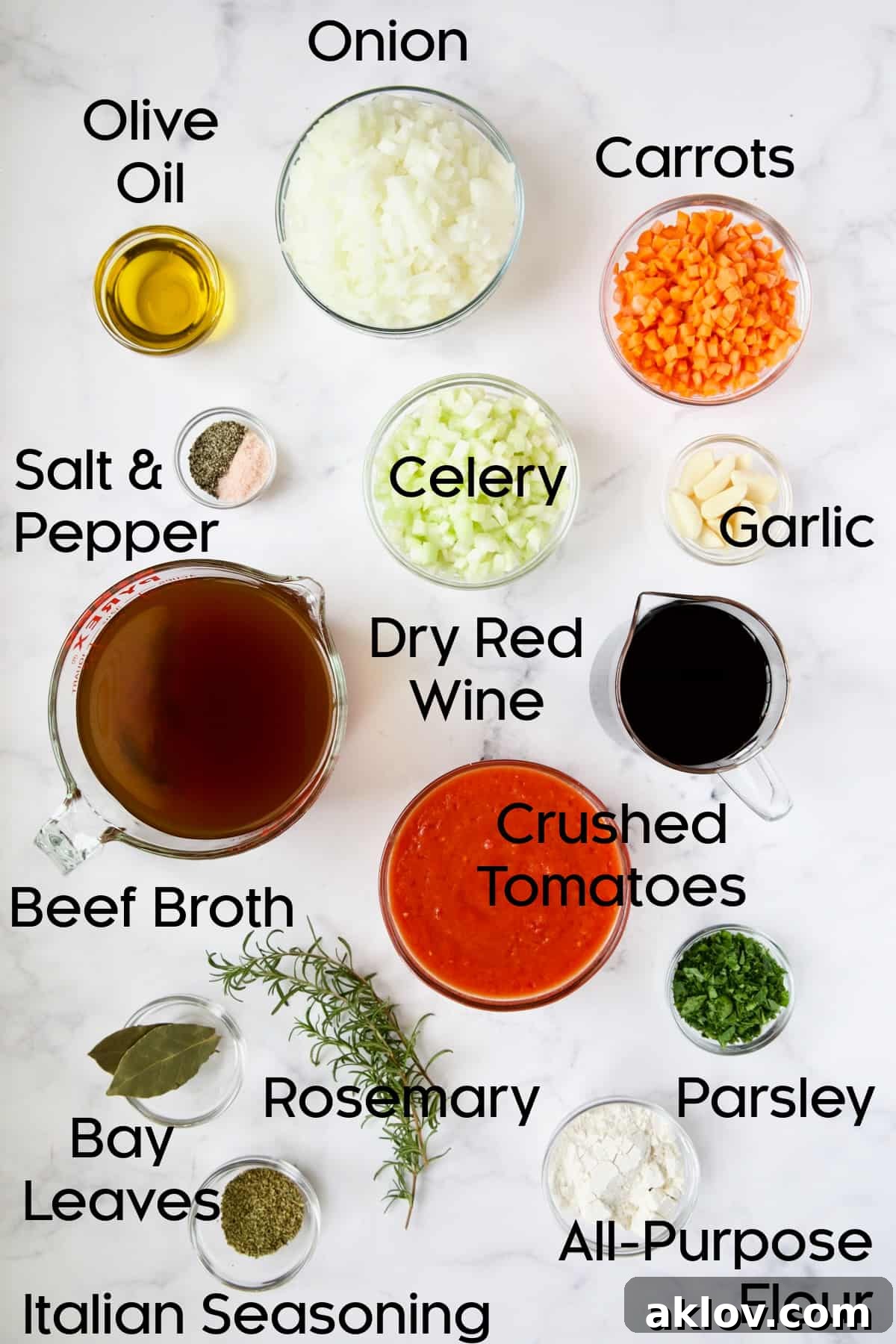 A curated selection of fresh ingredients for Braised Beef Short Ribs, including vegetables and spices.