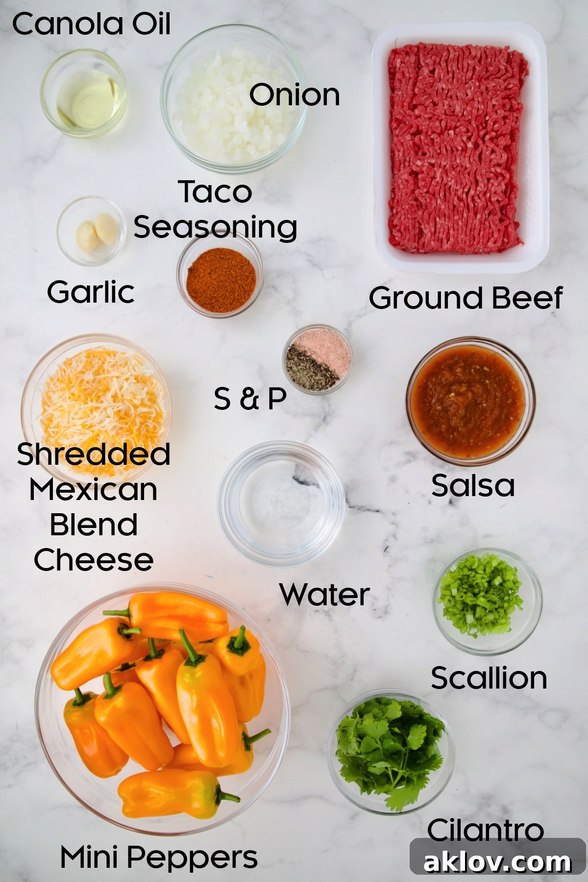 Mini Pepper Taco Poppers 4 Ingredients for Taco-Stuffed Mini Peppers in glass bowls.
