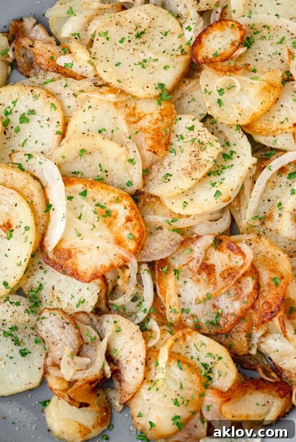 Hearty Fried Potatoes and Onions, a classic comfort food.