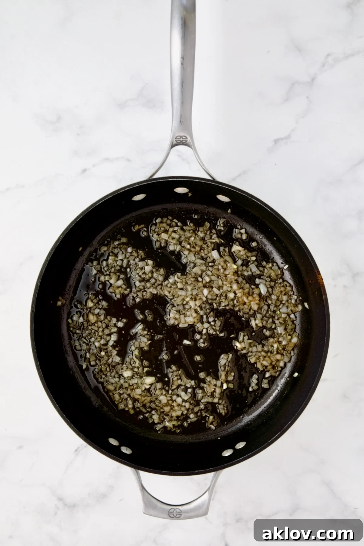 Cooked shallots in nonstick skillet.