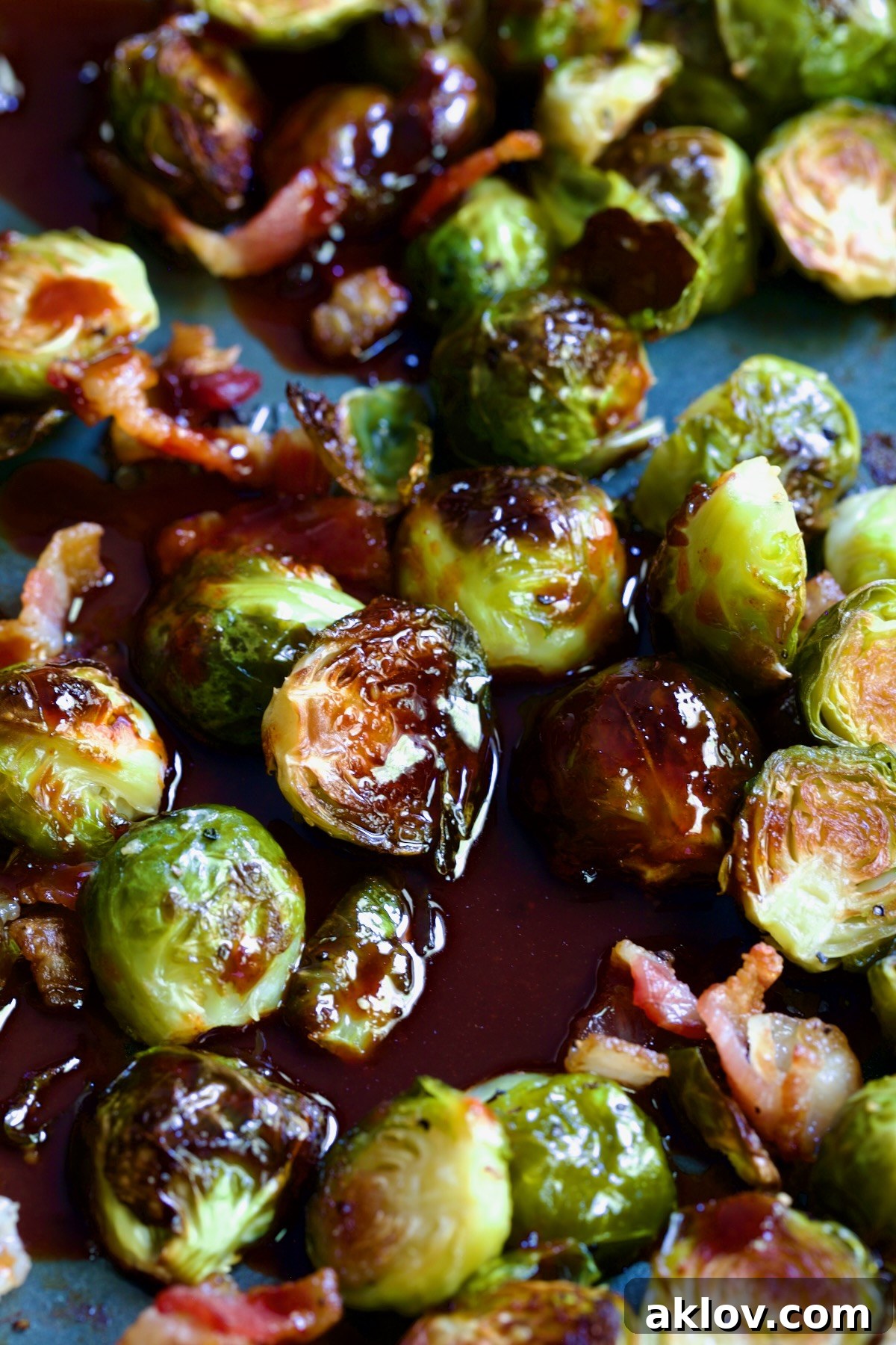 Glaze on Brussels sprouts on sheet pan.