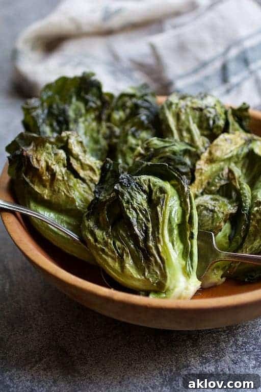 Duck Fat Roasted Cabbage Sprouts in wooden bowl.