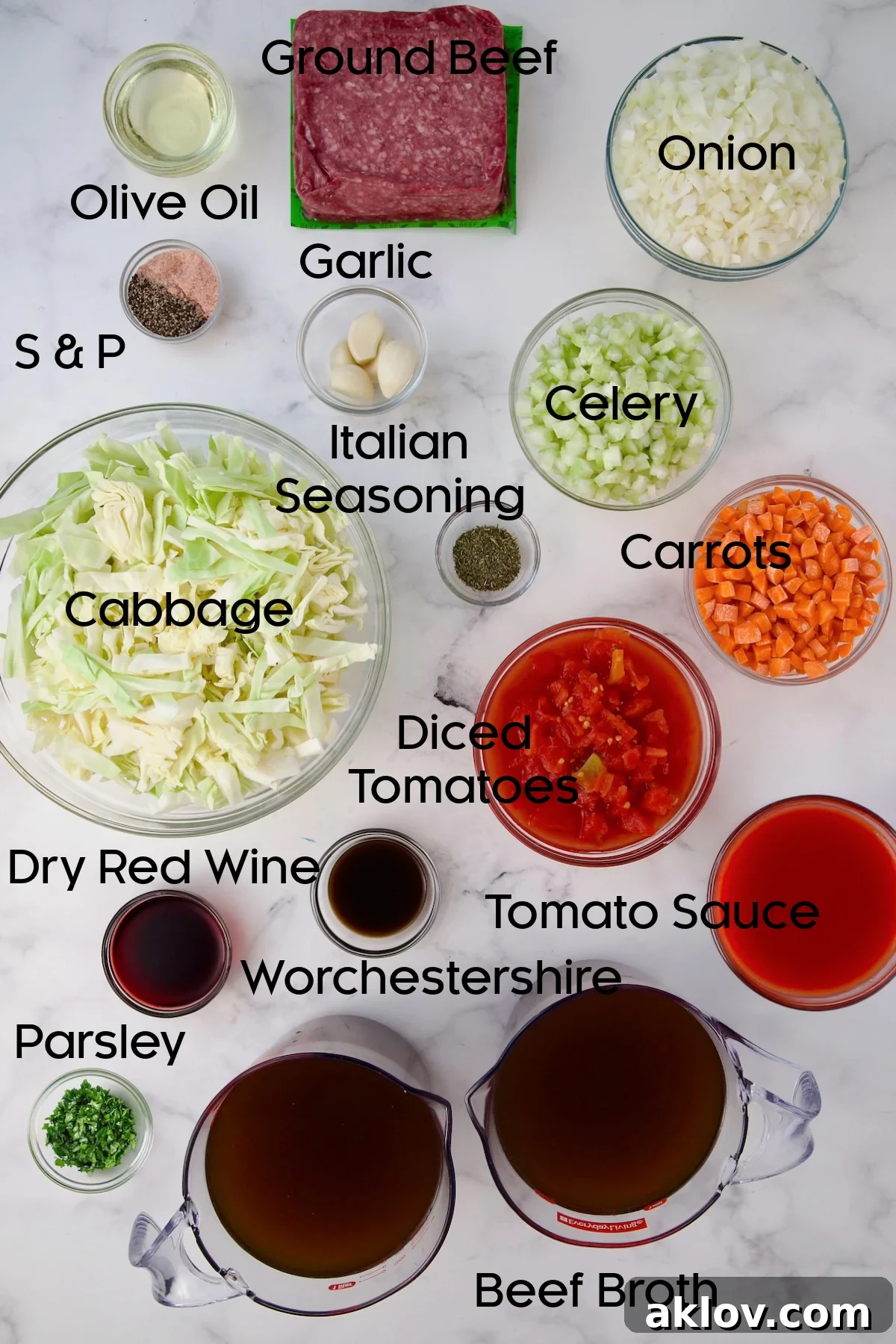 Ingredients for Beef and Cabbage Soup in glass bowls.
