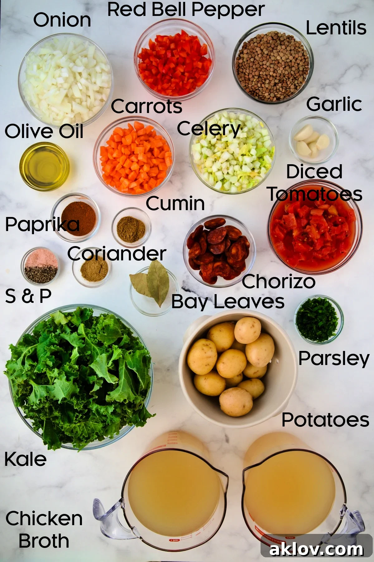Arranged ingredients for Spanish Lentil Potato Soup in various glass bowls.