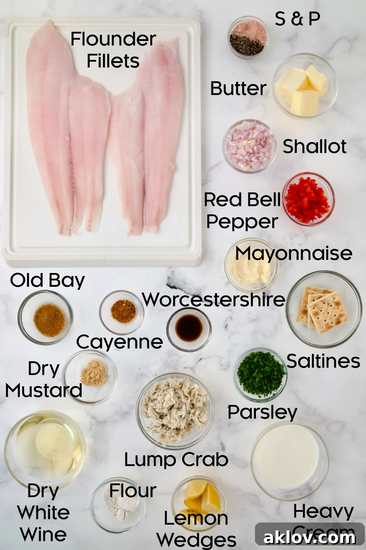 A selection of fresh ingredients for Crab-Stuffed Flounder, neatly arranged in glass bowls.