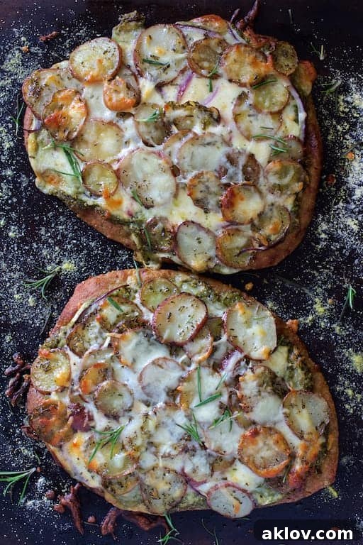 Whole baked Naan Potato Pizza with Radish Pesto and Smoked Mozzarella, fresh out of the oven.