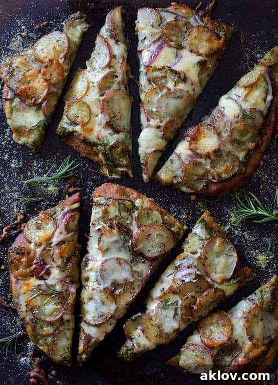 Naan Potato Pizza with Radish Pesto and Smoked Mozzarella cut into eight slices.
