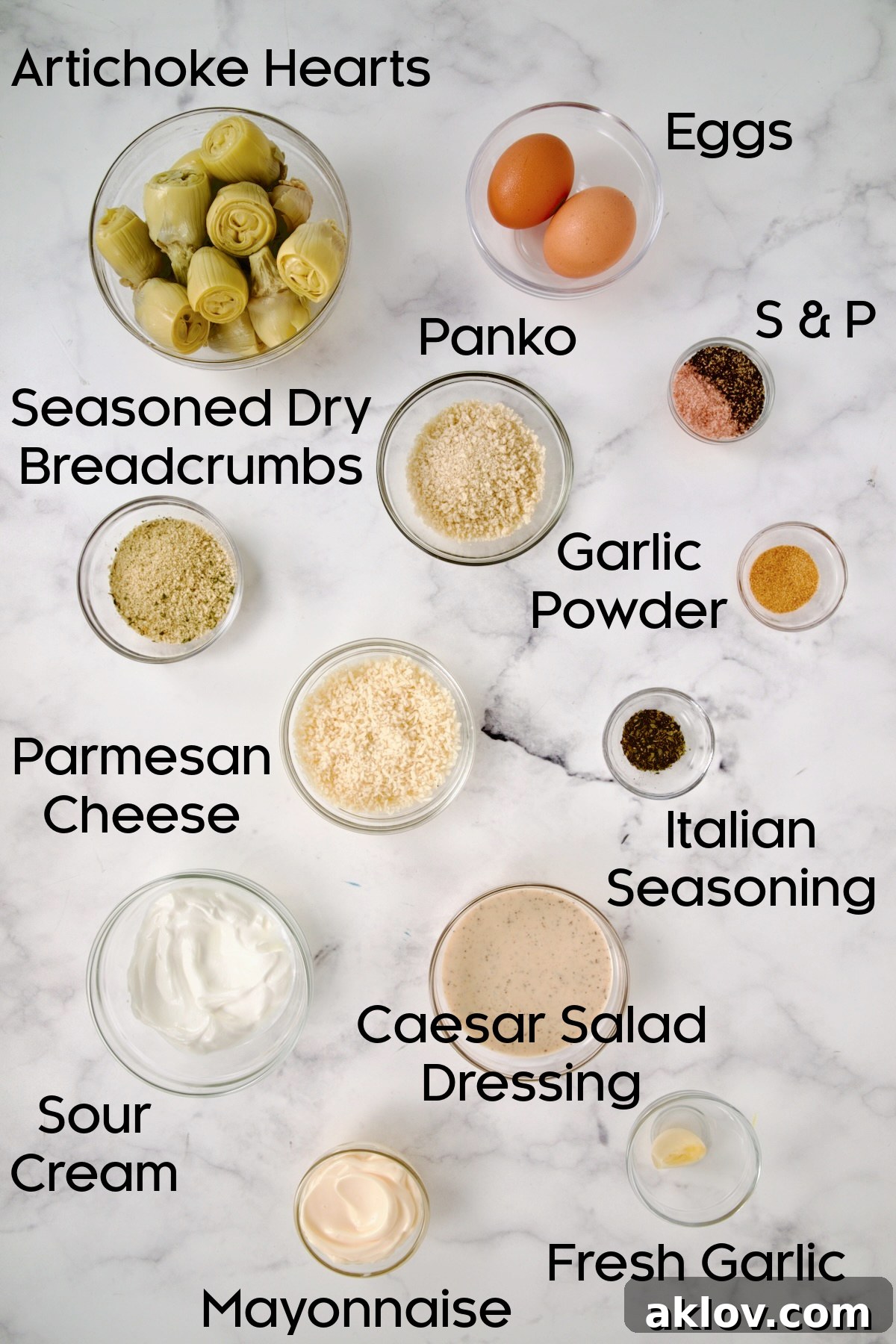 Ingredients for Crispy Parmesan Artichoke Hearts and Caesar Dip in glass bowls.