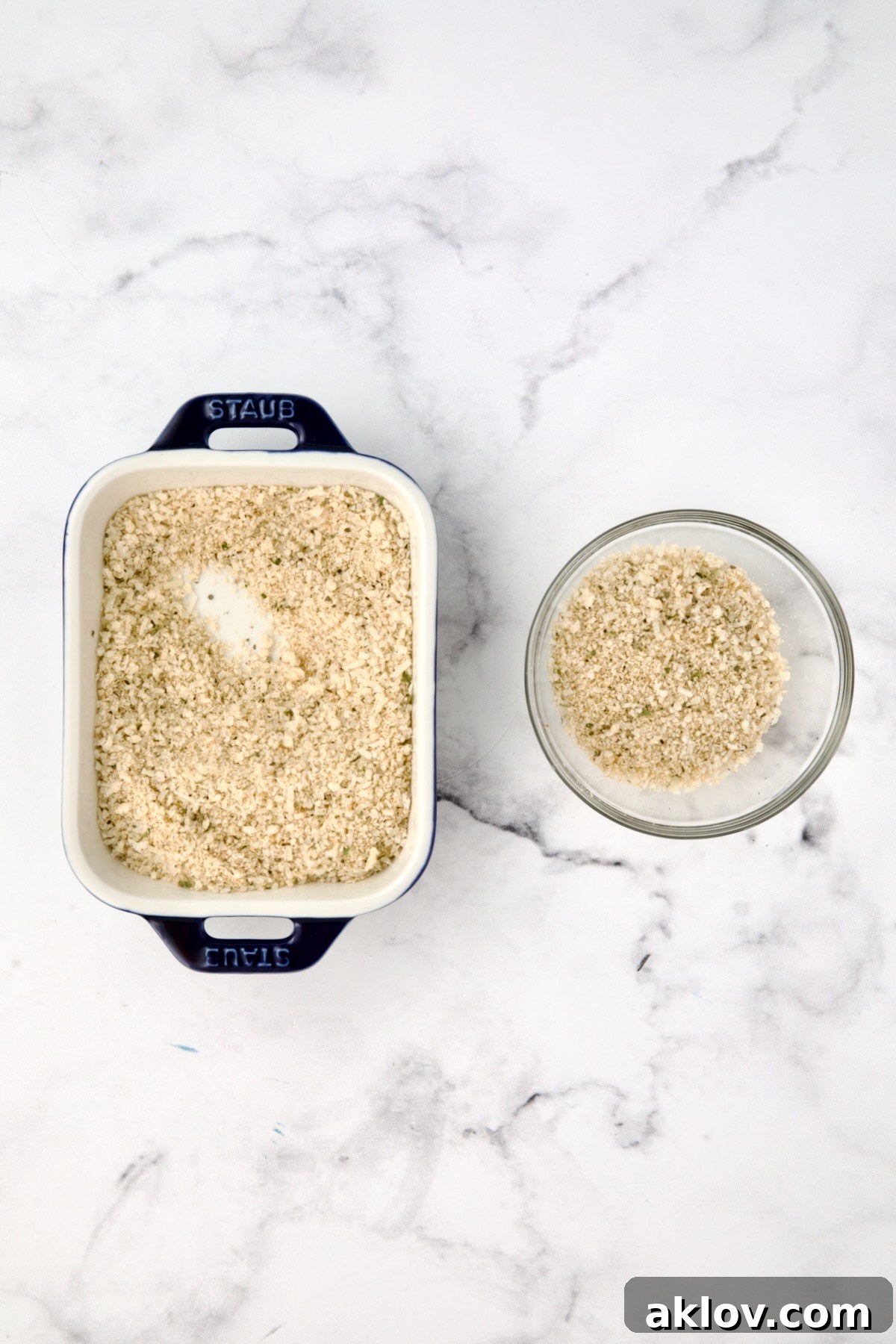 Breadcrumbs in two small containers.