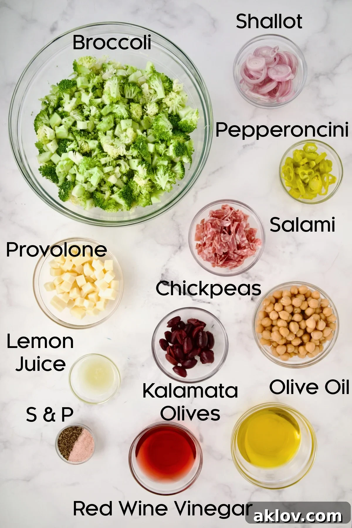 Ingredients for Italian Broccoli Salad in glass bowls.