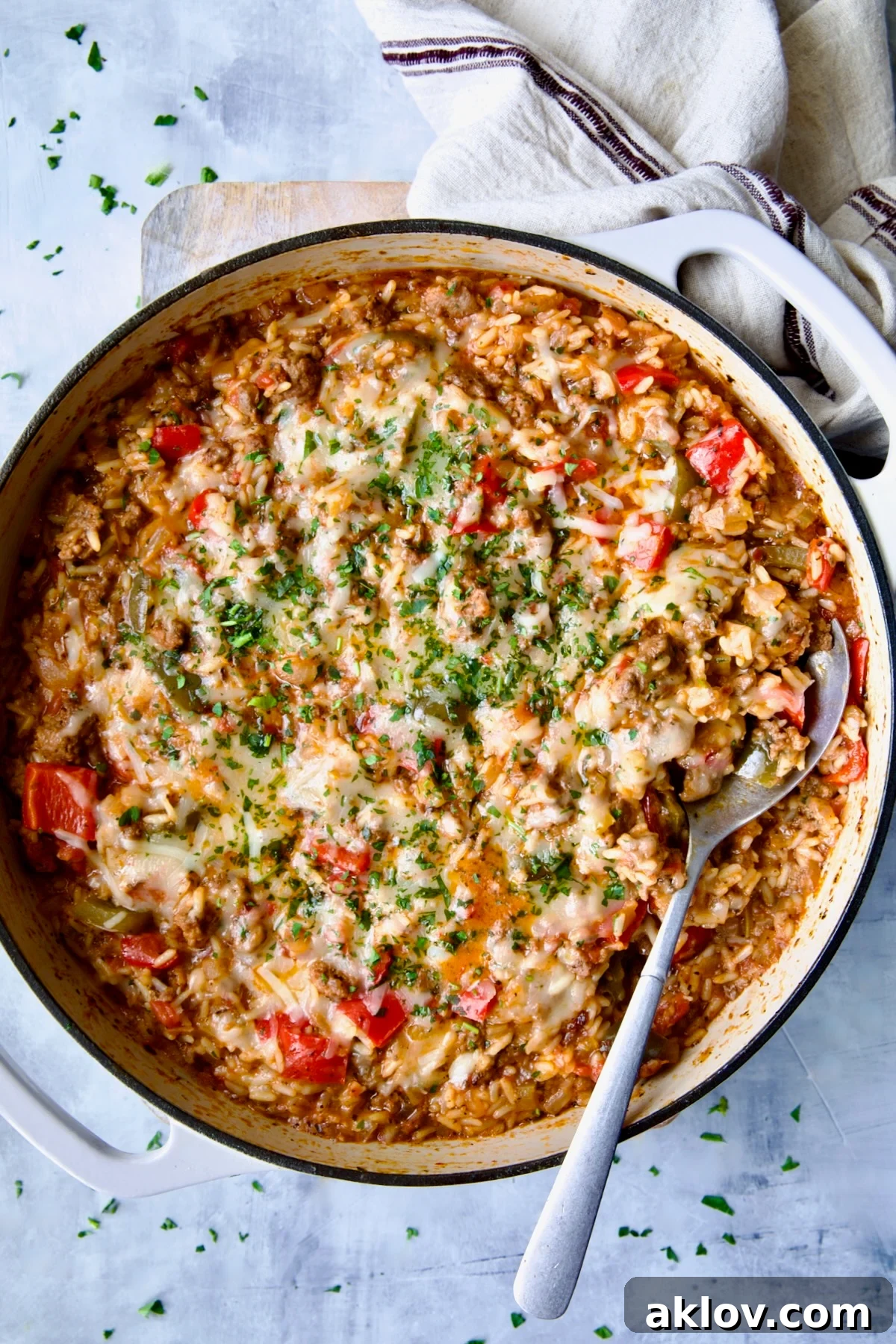 Vibrant Unstuffed Peppers Skillet, a one-pan comfort food delight, served in a white enamel cast iron skillet.