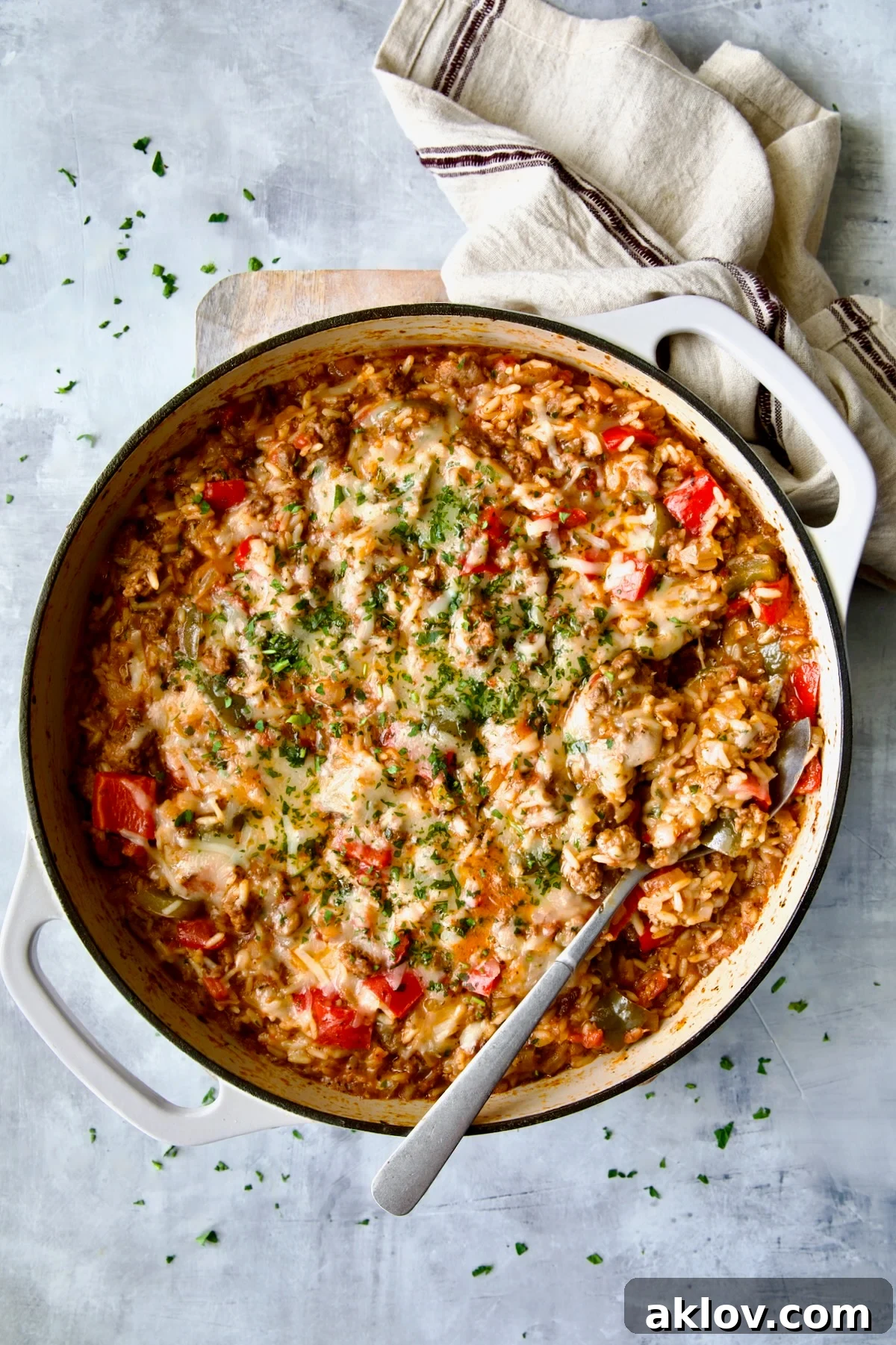 Delicious and hearty Unstuffed Peppers Skillet cooked to perfection in a white enamel cast iron pan.