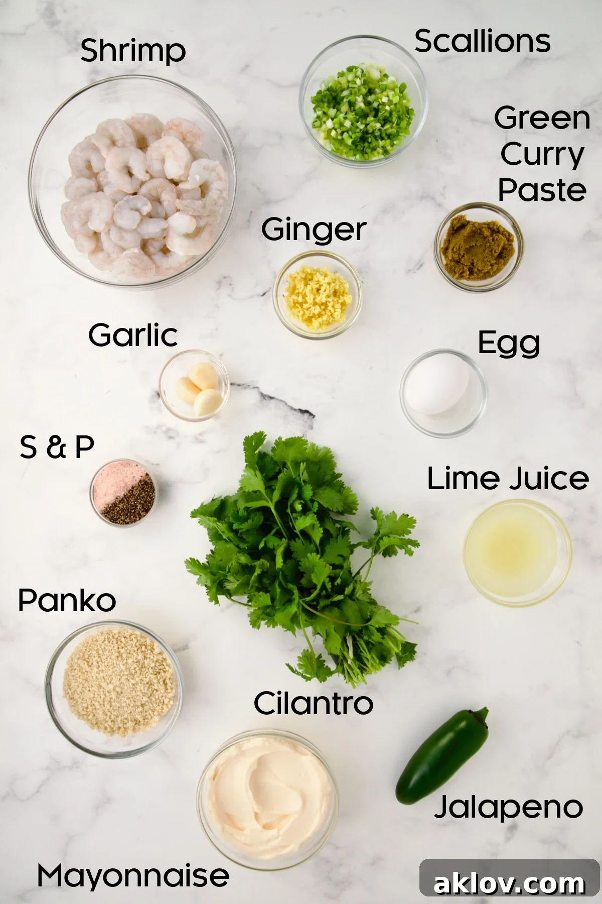 Ingredients for Thai Green Curry Shrimp Cakes in glass bowls.