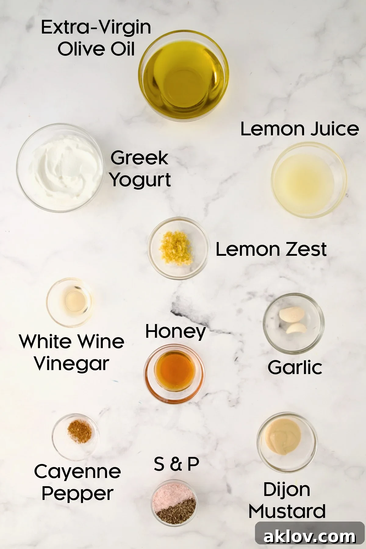 Ingredients for Creamy Lemon Dressing in glass bowls.