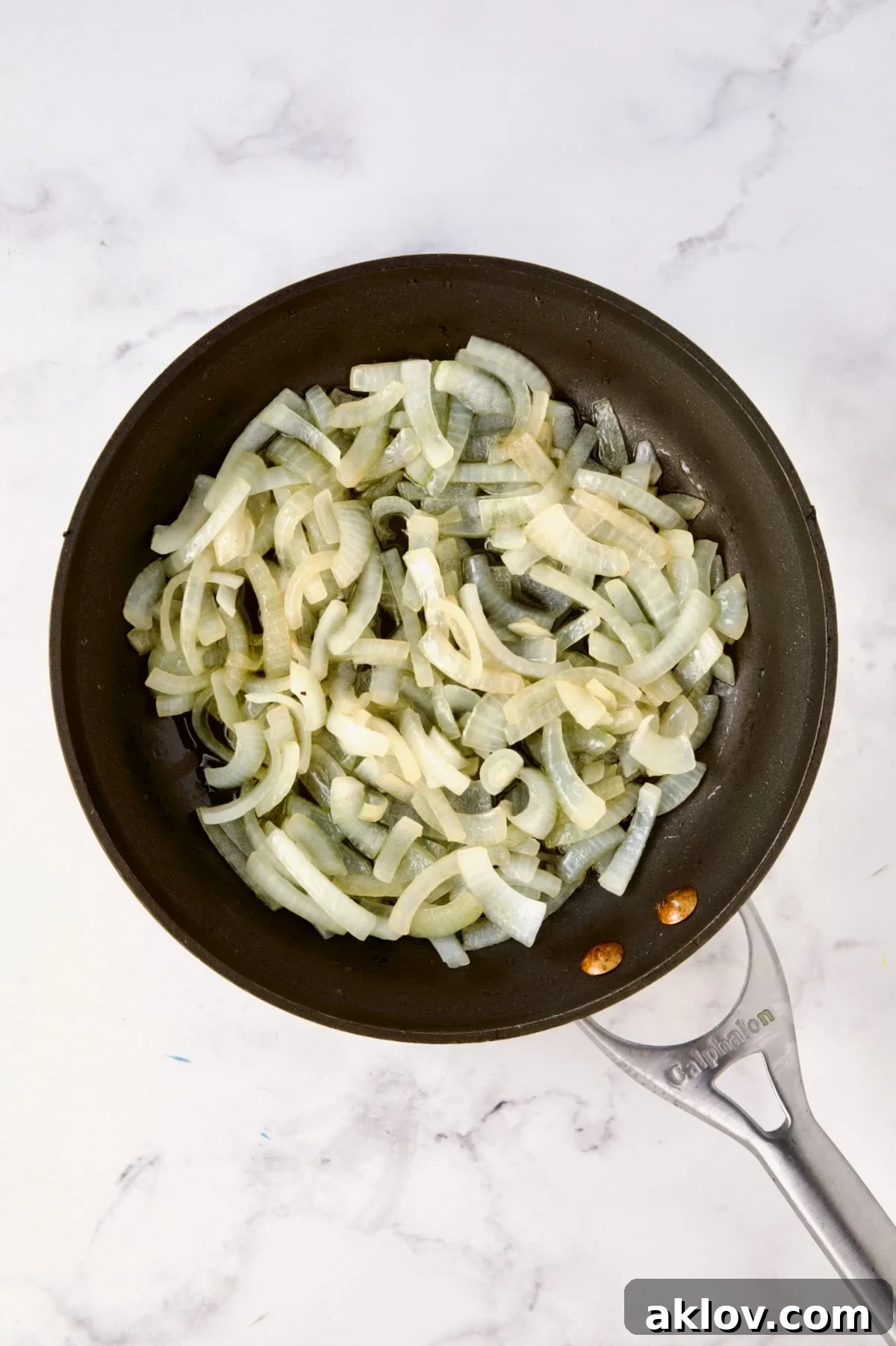 Cooked onions in nonstick skillet.