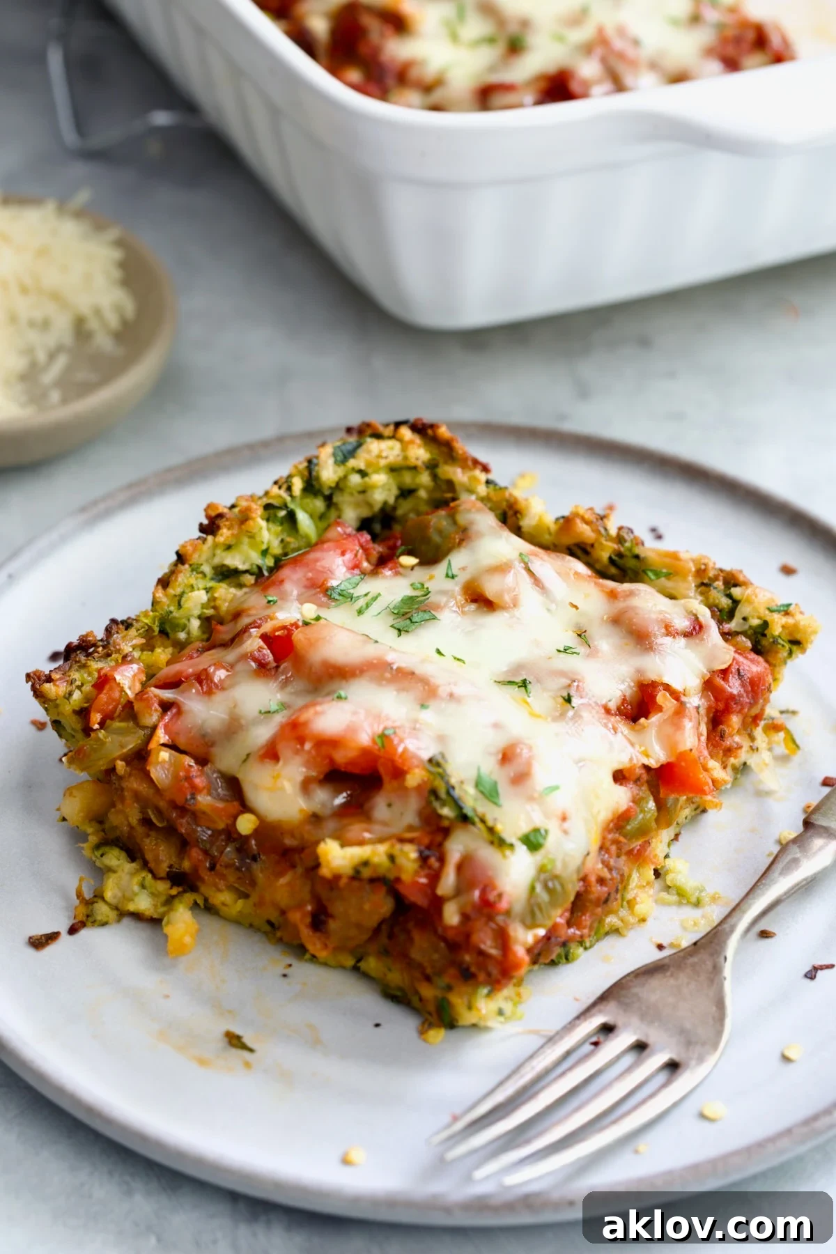 Piece of Zucchini Pizza Casserole on small plate.
