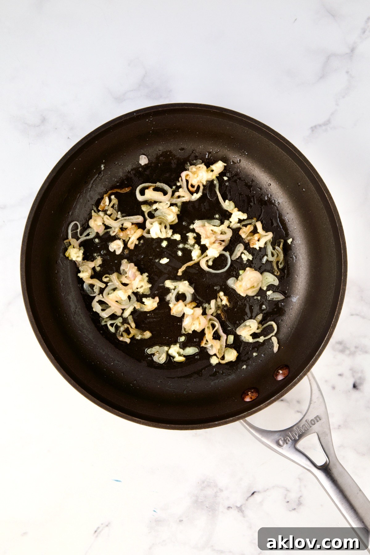 Softened sliced shallot and garlic in nonstick skillet.