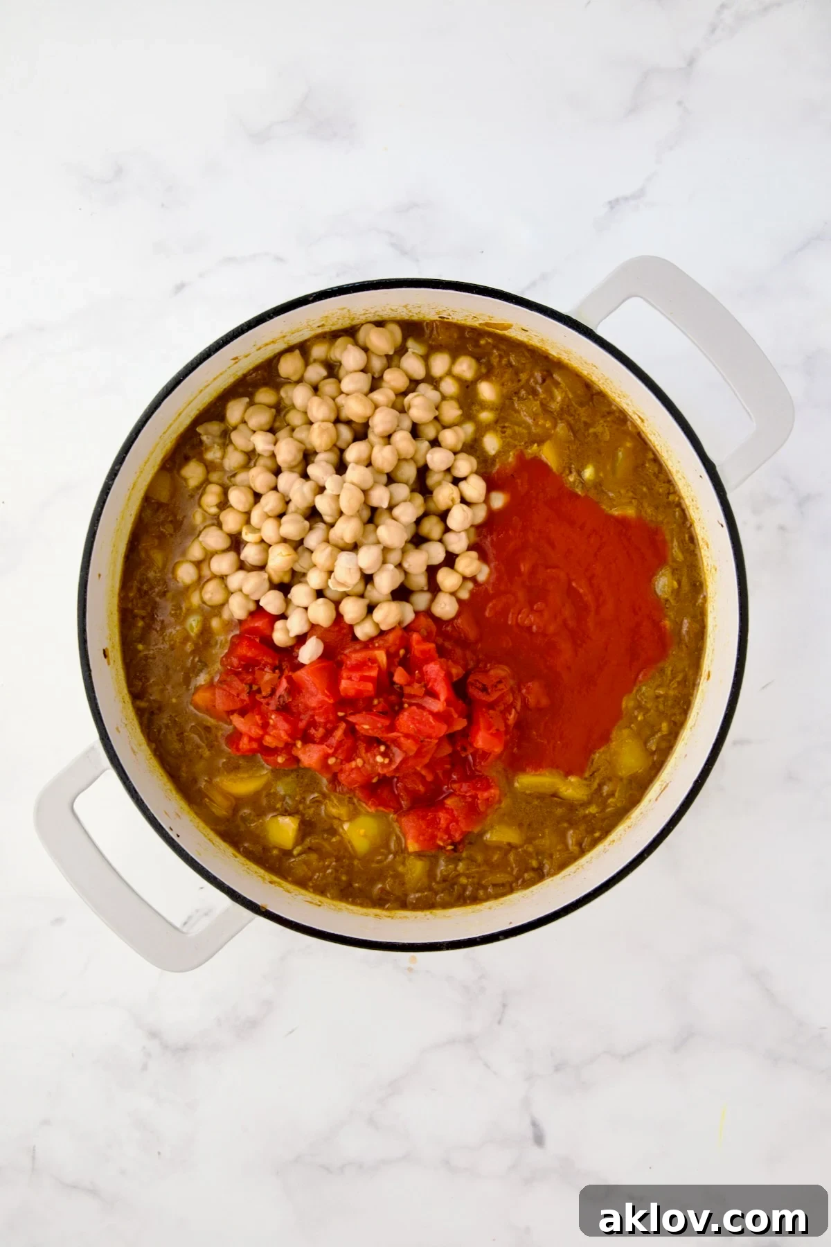 Tomatoes and chickpeas added