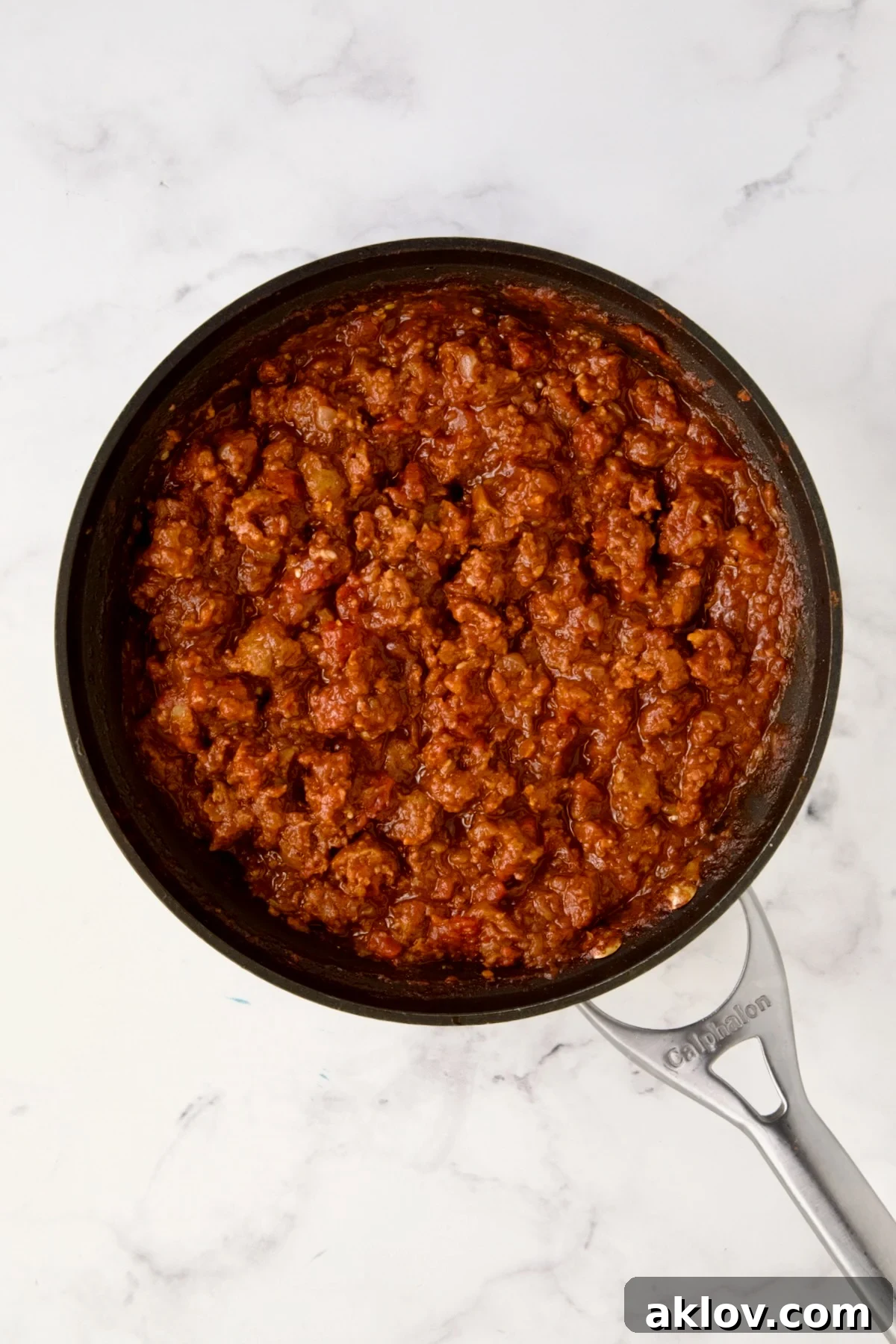 Cooked chorizo filling in nonstick skillet.